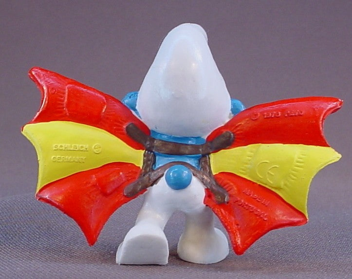 Hang Glider Smurf With Red & Yellow Bat Wings With Brown Straps PVC Figure, #20036, 1978 Peyo Schleich, W. Germany, Smurfs, Vintage, Figurine