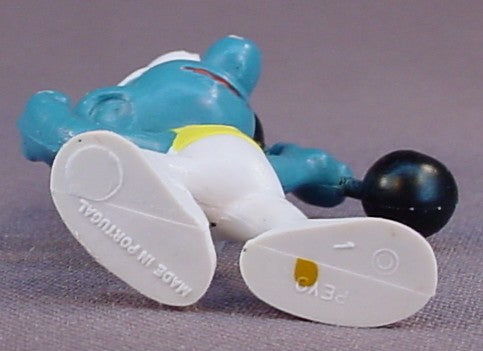 Smurf Wearing White & Yellow Tights & Holding A Black Barbell PVC Figure, #20020, 1972 Peyo, Made In Portugal, Smurfs, Vintage, Figurine, Mustard Yellow Dot