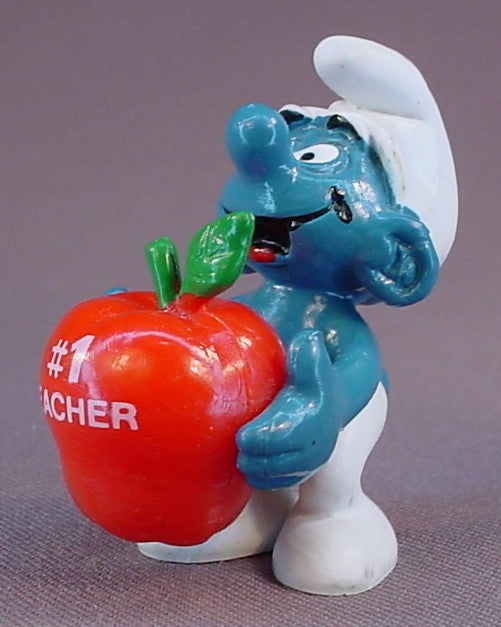 Smurf Holding A Red Apple With #1 Teacher Printed On It PVC Figure, #20160, 1983 Peyo Schleich, Hong Kong, W. Berrie Co., Smurfs, Vintage, Figurine