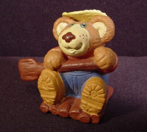 1986 Furskins PVC Figure Bear Paddling On A Log Raft, 2 1/8" Tall