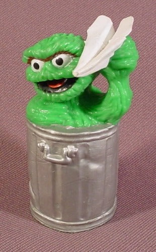 Sesame Street Oscar The Grouch With A Paper Airplane PVC Figure