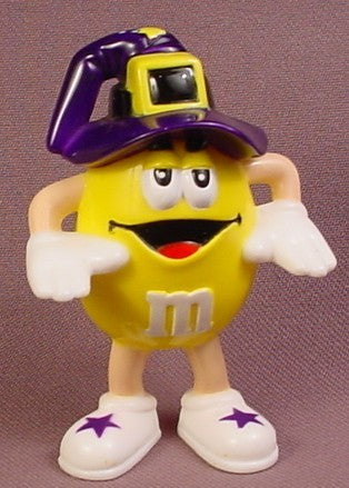 M&M Yellow Figure With A Purple Witch Hat, 2 3/4 Inches Tall, M & M