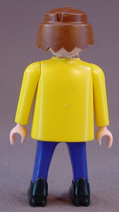 Playmobil Adult Male Hockey Player Figure In Blue Pants And A Yellow Jersey With Hockey Puck Design