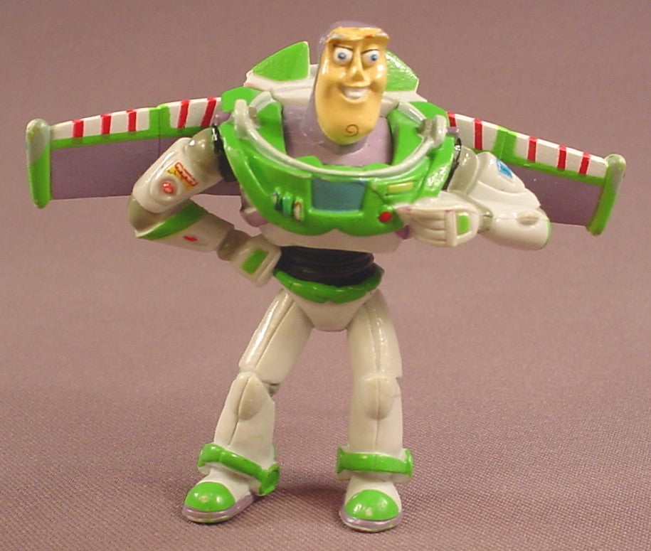 Disney Toy Story Buzz Lightyear With His Wings Extended PVC Figure, 2 3/4 Inches Tall, 3 1/2 Inches Across The Wings