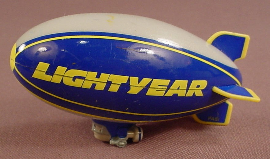 Disney Toy Story Hard Plastic Blimp Or Balloon With Lightyear Printed Across The Side, 3 1/2 Inches Long