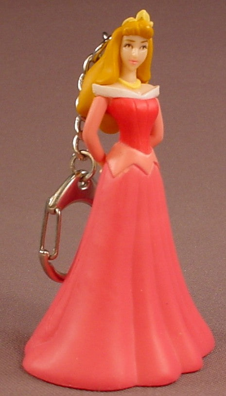 Disney Sleeping Beauty Princess Aurora With Her Hands Clasped Behind Her Back PVC Figure Keychain, 3 5/8 Inches Tall