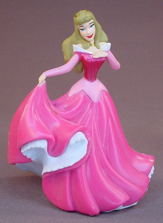 Disney Sleeping Beauty Princess Aurora Holding Her Flowing Pink Gown In One Hand PVC Figure, 3 3/4 Inches Tall