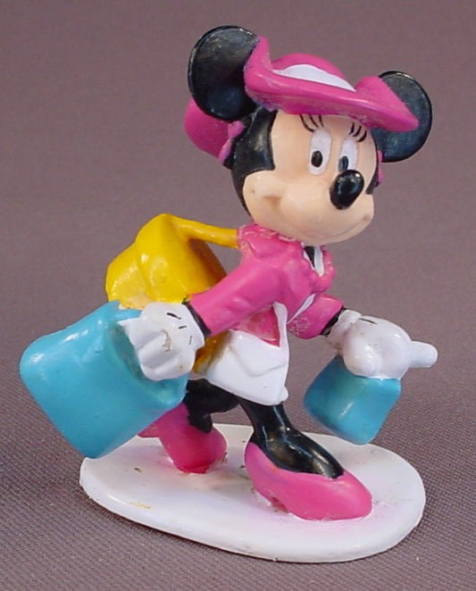 Disney Minnie Mouse In A Pink Coat & Hat Carrying Her Shopping Bags PVC Figure On A Base, 2 3/4 Inches Tall, Applause