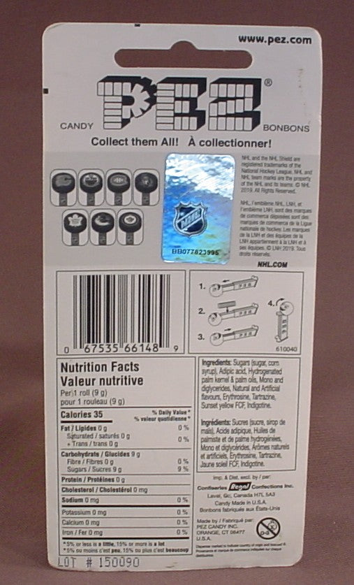 Pez NHL Hockey Edmonton Oilers Logo On A Black Puck, In The Original Packaging, Orange Stem With The NHL Logo, Pez Candy Dispenser