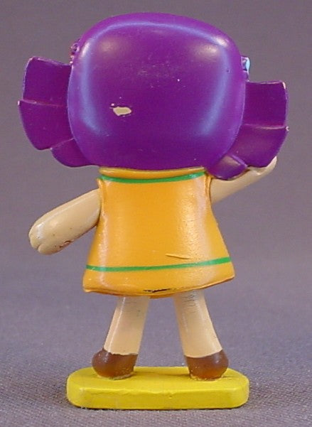 Disney Toy Story 3 Dolly PVC Figure On A Yellow Base, 2 Inches Tall, Pixar, Has A Small Paint Rub On The Back Of The Head