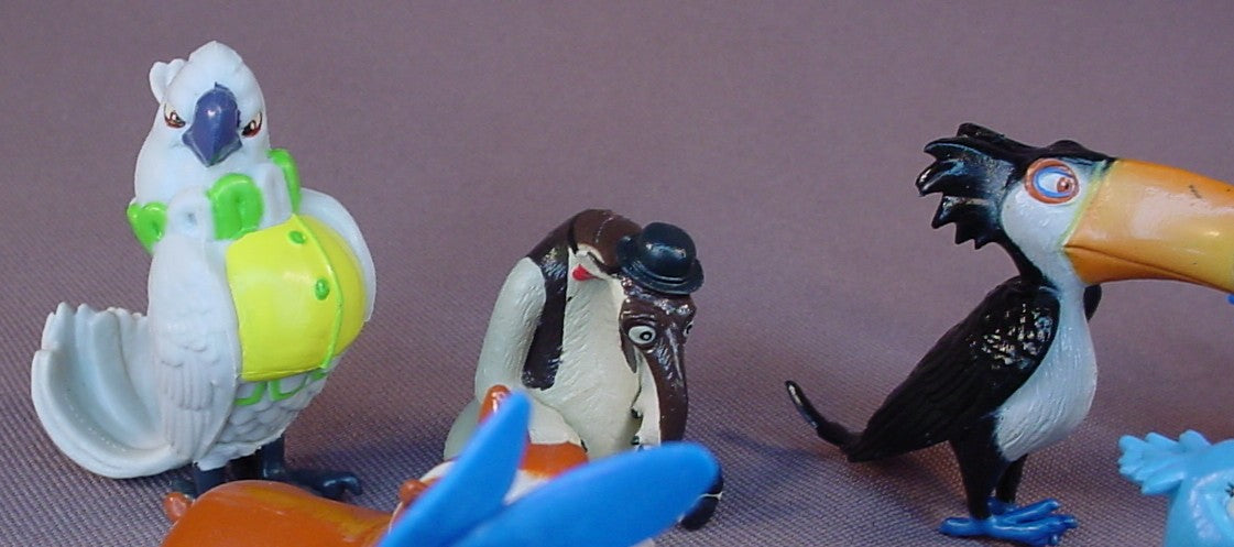Rio 2 Movie Set Of 11 Figures, 1 1/2 To 2 1/4 Inches Tall, Fox, Blu, Gabi Tree Frog, Luiz Bulldog, Pedro Cardinal, Rafael Toucan, Charlie Anteater, Nigel Cockatoo, Nico Canary, Tiago Macaw, MimiMacaw