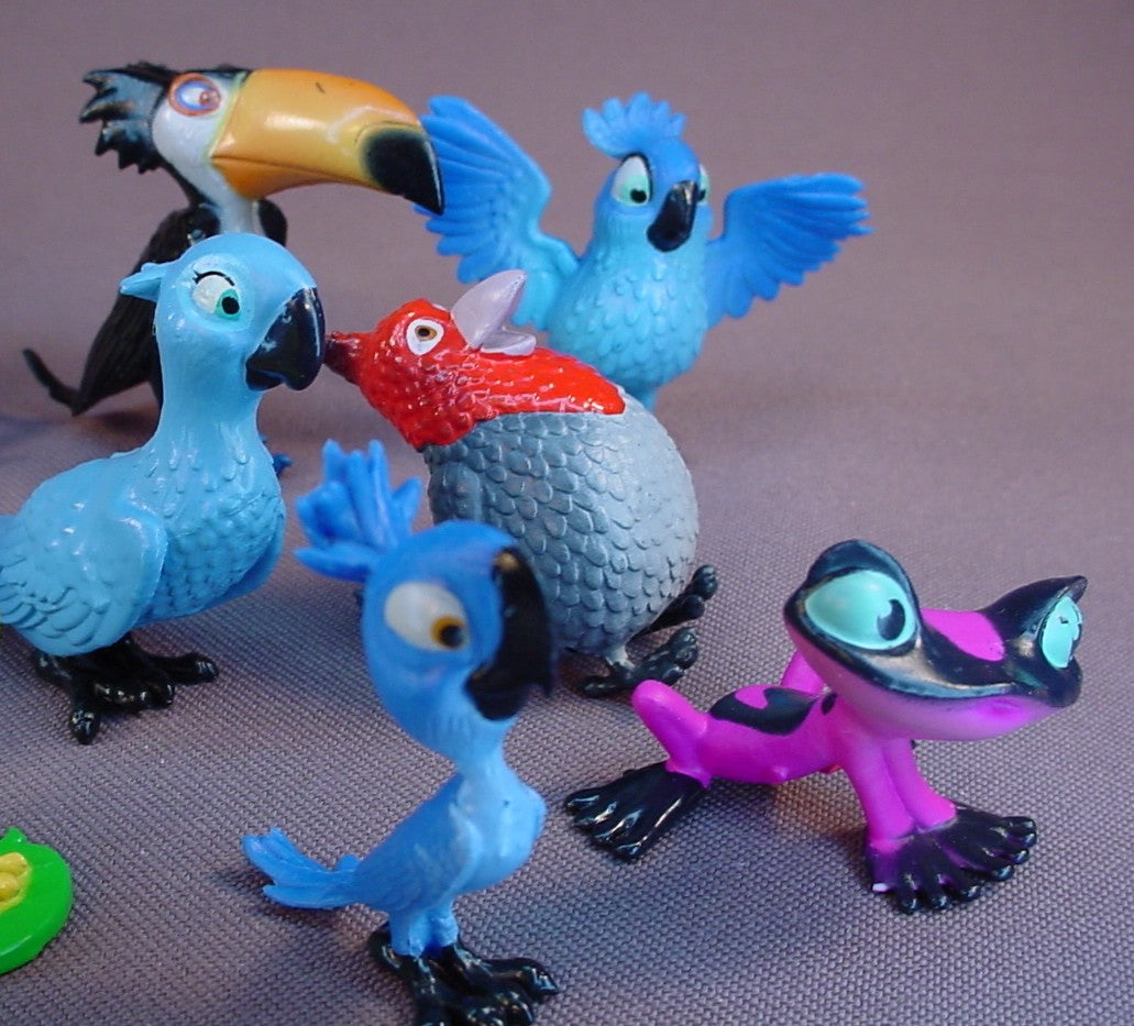 Rio 2 Movie Set Of 11 Figures, 1 1/2 To 2 1/4 Inches Tall, Fox, Blu, Gabi Tree Frog, Luiz Bulldog, Pedro Cardinal, Rafael Toucan, Charlie Anteater, Nigel Cockatoo, Nico Canary, Tiago Macaw, MimiMacaw