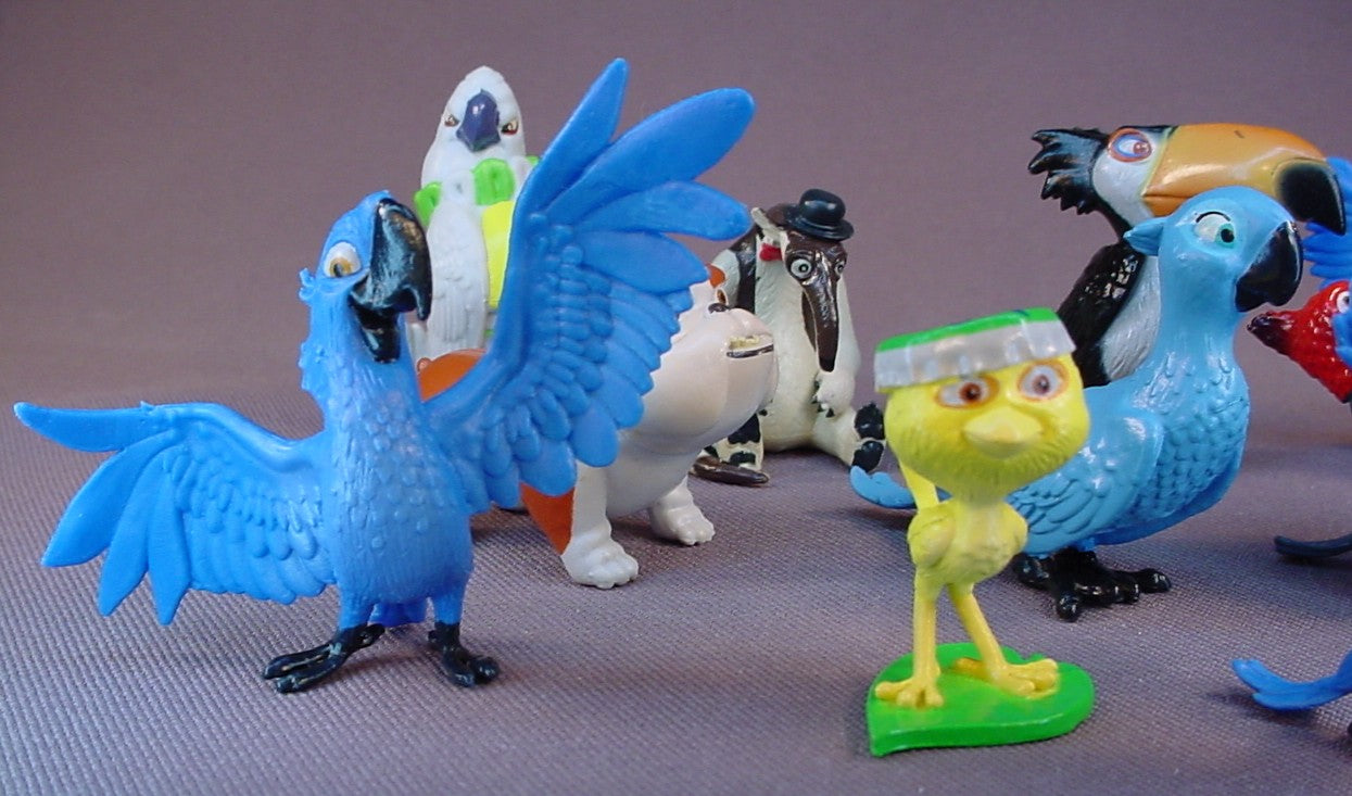 Rio 2 Movie Set Of 11 Figures, 1 1/2 To 2 1/4 Inches Tall, Fox, Blu, Gabi Tree Frog, Luiz Bulldog, Pedro Cardinal, Rafael Toucan, Charlie Anteater, Nigel Cockatoo, Nico Canary, Tiago Macaw, MimiMacaw