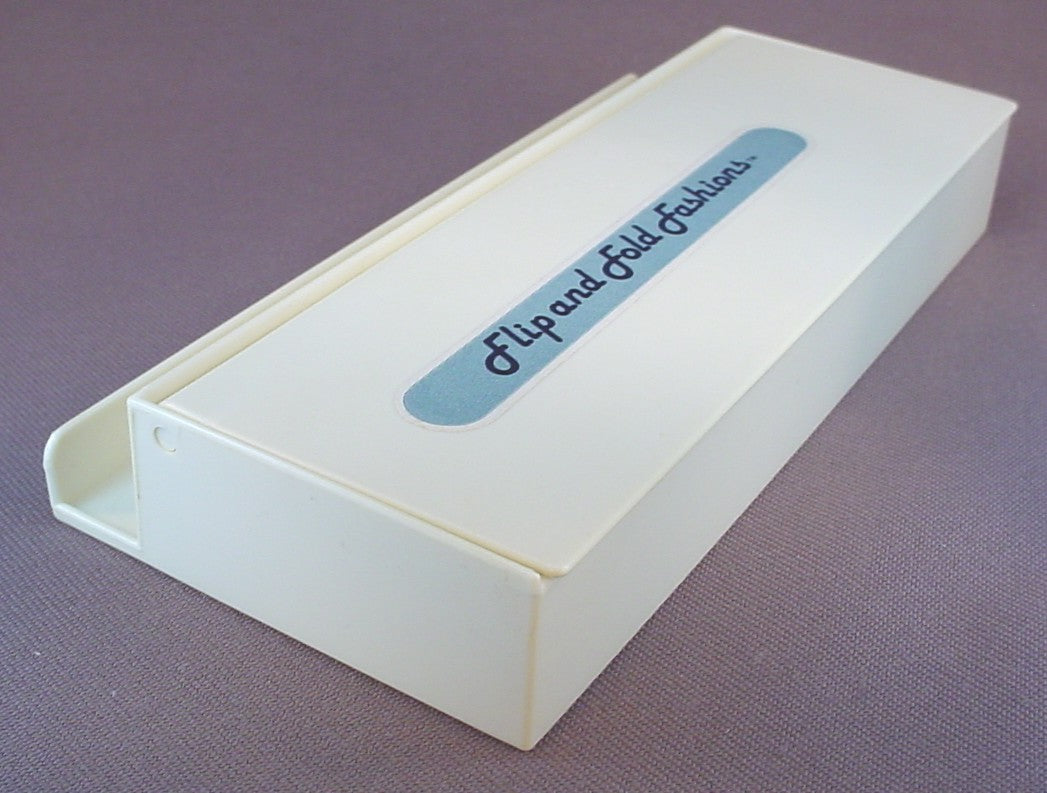 Vintage Tomy 1981 Flip And Fold Fashions Storage Box With 17 Accessories, The Accessories Clip Into A Base To Accessorize The Fashions Created