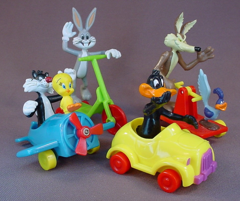 Looney Tunes Complete Set Of 4 Vehicles And PVC Figures, 1989 McDonalds, Wile E Coyote And Roadrunner On A Hand Pump Railway Truck, Daffy Duck In A Car, Bugs Bunny On A Scooter, Sylvester And Tweety In An Airplane
