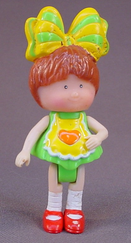 Silverlit Bonnie Doll With A Green And Yellow Bow, Red Shoes, Orange Heart, The Legs And Arms Move, The Head Swivels, 3 Inches Tall, Bonnie Big Bow, Vintage Early 1990's, Silverlit Toys
