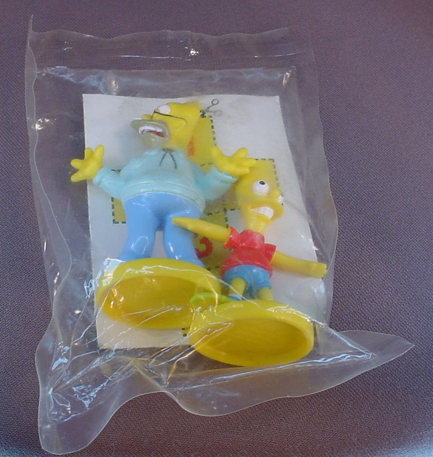 The Simpsons Grampa And Bart Figures In The Sealed Bag, 2003 Kellogg's Cereal Premiums, Simpson Family, Grampa Is 3 1/8 Inches Tall, PVC Figures On A Base, Kelloggs, Kellogg