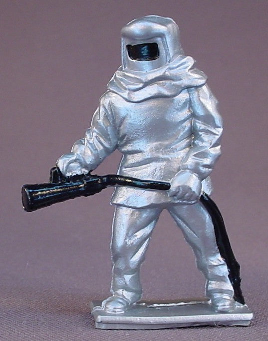 Firefighter PVC Figure Dressed In A Silver Suit, 2 1/4 Inches Tall, Airport Or Racetrack Crash Crew, Vintage, 1970S, Pioneer, Fireman, Race Track