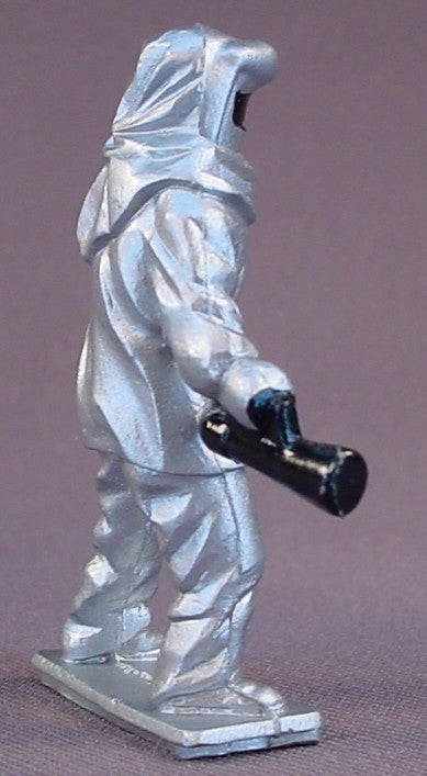 Firefighter PVC Figure Dressed In A Silver Suit, 2 1/4 Inches Tall, Airport Or Racetrack Crash Crew, Vintage, 1970S, Pioneer, Fireman, Race Track
