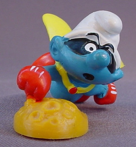 Superman Smurf With A Yellow Cape PVC Figure, There Is A Crack In The Joint Where His Hand Connects To The Base,  Super Hero, #20127, 1980 Peyo Schleich, W. Germany, Smurfs, Vintage, Figurine