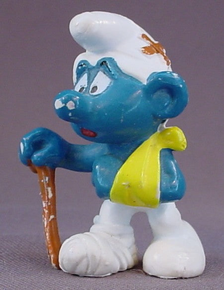 Injured Smurf With An Arm In A Sling And A Bandaged Foot PVC Figure, Walking With A Cane, #20097, 1978 Peyo Bully, Made In Hong Kong, Smurfs, Vintage, Figurine
