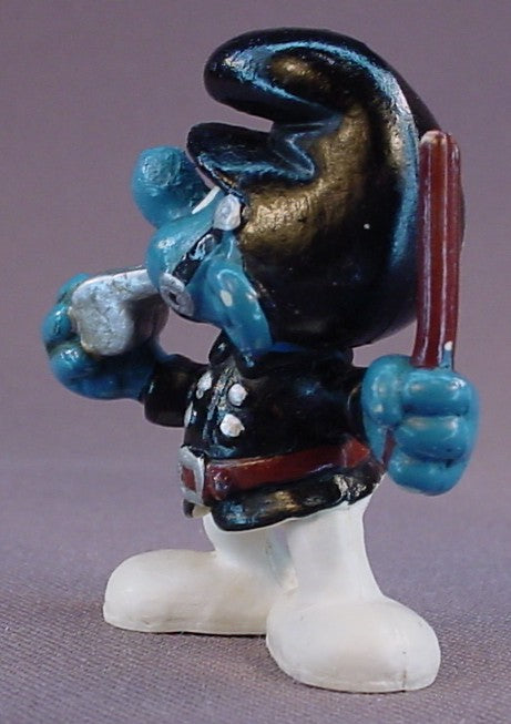 Policeman Smurf In A Black Uniform & Blowing A Silver Whistle PVC Figure, Darker Skin, #20123, 1981 Peyo Schleich, W. Berrie & Co., Made In Hong Kong, Smurfs, Vintage, Figurine