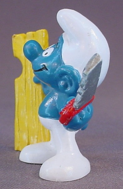 Carpenter Smurf Holding A Saw & A Piece Of Wood PVC Figure, #20112, 1980 Peyo Bully, West Germany, Smurfs, Vintage, Figurine