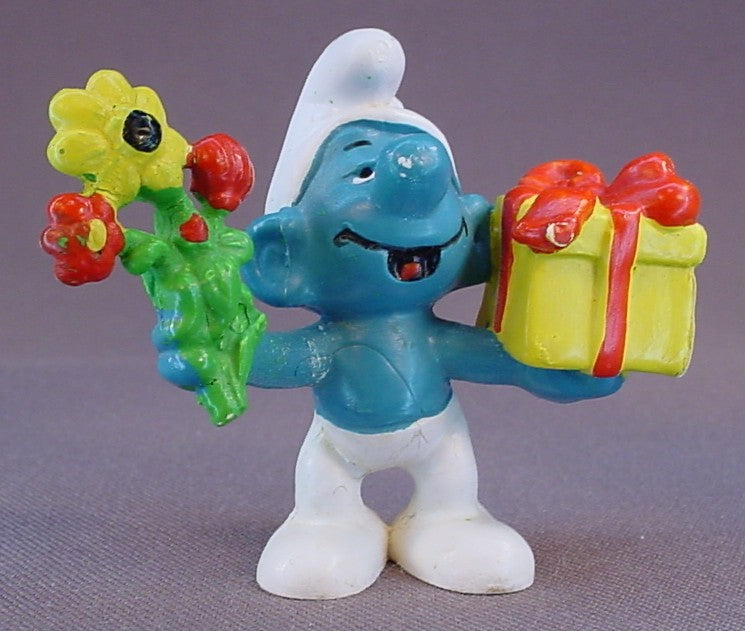 Smurf Holding A Gift & A Flower PVC Figure, #20040, 1978 Peyo Schleich, West Germany, Smurfs, Vintage, Figurine, Mustard Yellow Dot