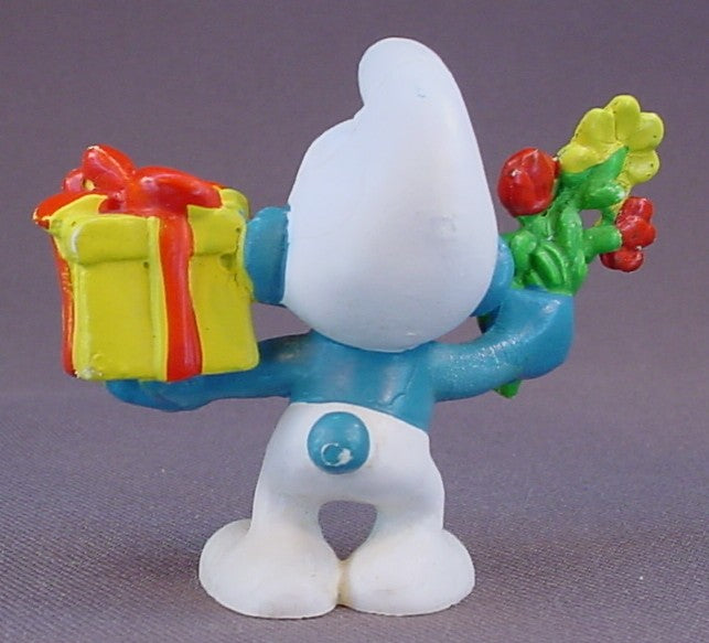 Smurf Holding A Gift & A Flower PVC Figure, #20040, 1978 Peyo Schleich, West Germany, Smurfs, Vintage, Figurine, Mustard Yellow Dot
