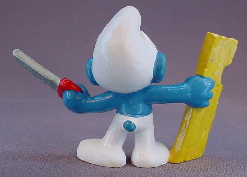 Carpenter Smurf Holding A Saw & A Piece Of Wood PVC Figure, #20112, 1980 Peyo Bully, West Germany, Smurfs, Vintage, Figurine