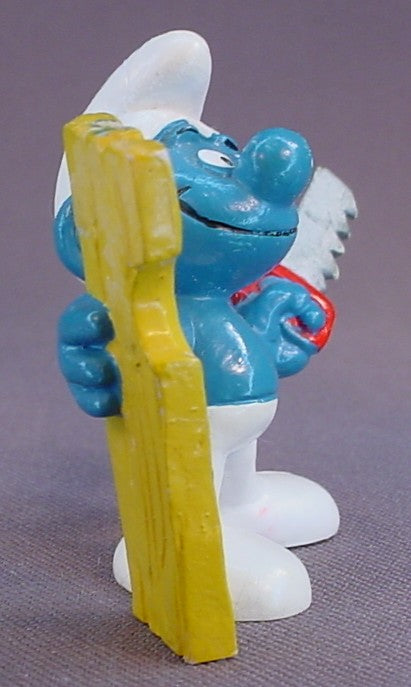 Carpenter Smurf Holding A Saw & A Piece Of Wood PVC Figure, #20112, 1980 Peyo Bully, West Germany, Smurfs, Vintage, Figurine