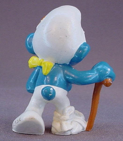 Injured Smurf With His Arm In A Sling & A Bandaged Foot PVC Figure, Walking With A Cane, #20097, 1978 Peyo Bully, West Germany, Smurfs, Vintage, Figurine