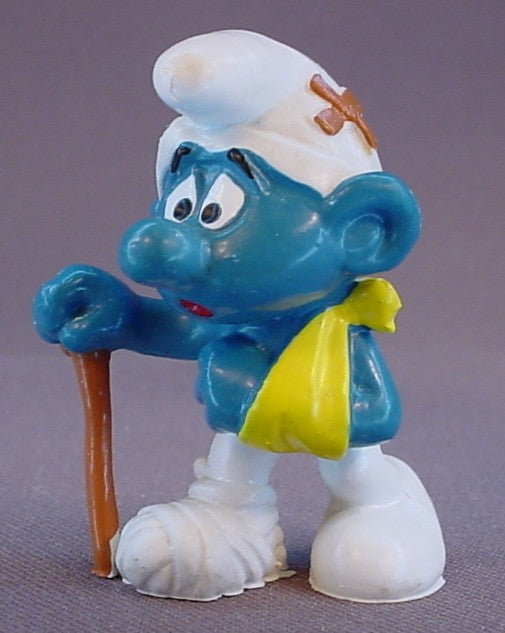 Injured Smurf With His Arm In A Sling & A Bandaged Foot PVC Figure, Walking With A Cane, #20097, 1978 Peyo Bully, West Germany, Smurfs, Vintage, Figurine
