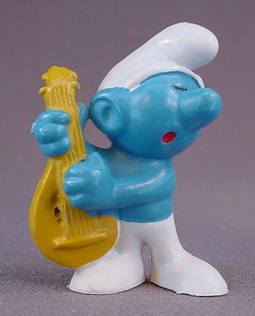 Smurf Playing A Tan Or Brown Lute PVC Figure, #20013, 1969 Peyo, Made In Portugal, Smurfs, Vintage, Figurine, Mustard Yellow Or Orange Dot