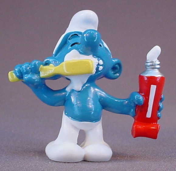 Smurf Brushing His Teeth PVC Figure, #20064, This Variation Has A Brighter Yellow Tooth Brush And A Toothpaste Tube With A Thin White Stripe, 1979 Peyo Schleich, Made In China, Smurfs, Vintage, Figurine