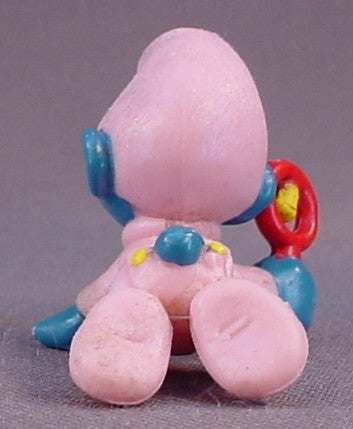 Baby Smurf In A Pink Sleeper & Holding A Rattle PVC Figure, #20202, 1984 Peyo Schleich, Smurfs, Vintage, Figurine, W. Berrie & Co.