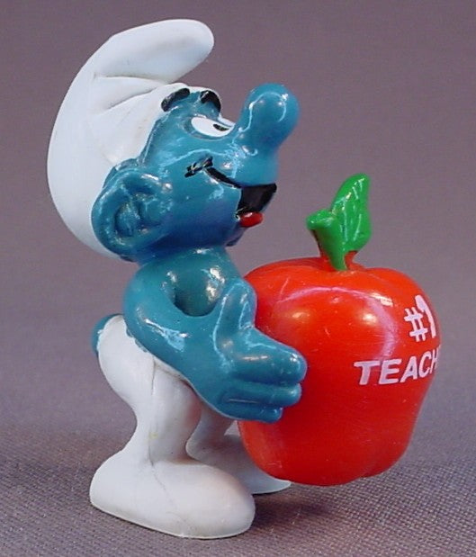 Smurf Holding A Red Apple With #1 Teacher Printed On It PVC Figure, #20160, 1983 Peyo Schleich, Hong Kong, W. Berrie Co., Smurfs, Vintage, Figurine