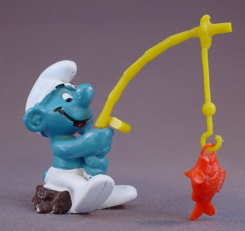 Angler Smurf Catching A Rare Orange Fish While Sitting On A Stump PVC Figure, Super Smurf Series, #40207, 1979 Peyo Schleich, West Germany, Smurfs, Vintage, Figurine