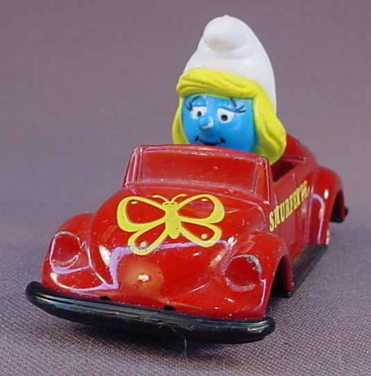 Smurfette Driving A Red Diecast Metal Convertible Car With A Butterfly Design, The Axles Are Bent So It Doesn't Roll True, Smurfs, Vintage, Figurine, Die-Cast, 1983 The ERTL Co., Wallace Berrie & Co., Hong Kong