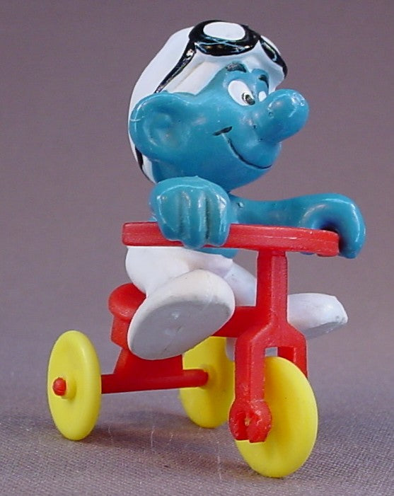 Smurf Wearing Goggles PVC Figure Riding His Red Tricycle, Super Smurf Series, #40203, 1978 Peyo Schleich, West Germany, Smurfs, Vintage, Figurine