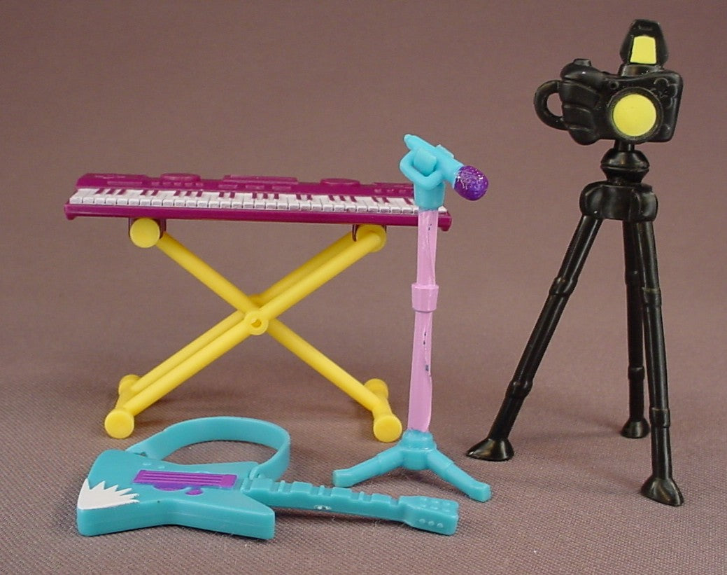 Littlest Pet Shop Set Of 4 Accessories From A Totally Talented Pet Band Set, Keyboard With Removable Stand, Electric Guitar, Microphone On A Stand, Tripod And Removable Camera, Hasbro