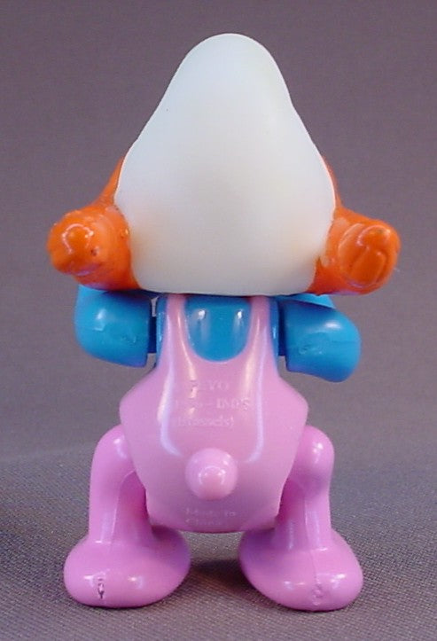 Sassette Smurfling Smurf Figure, 2 3/4 Inches Tall, From A Smurf & Picnic Wishing Well Set, Has A Vinyl Head And Spring Loaded Arms, The Legs Move, The Head Turns, 1995 Peyo Imps, Brussels, Irwin