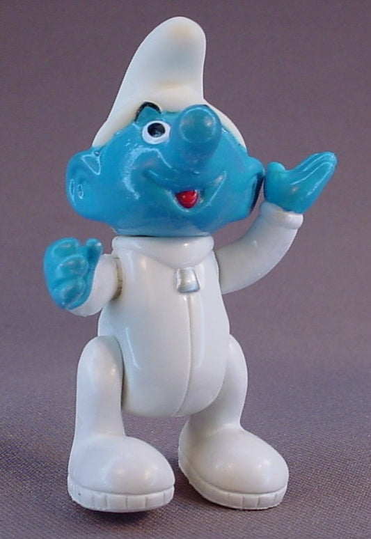 Astrosmurf Smurf Figure, 3 Inches Tall, From A 1996 The Smurfs Saturn Ride Play Set, Has A Vinyl Head And Spring Loaded Arms, The Legs Move, The Head Turns, 1995 Peyo Imps, Brussels, Irwin