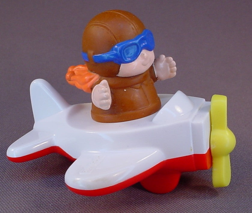 Fisher Price Girl With Red Or Orange Hair Flying A White And Red Airplane, The Pilot Turns In Her Seat, The Propeller Spins, McDonalds Under 3 Toy