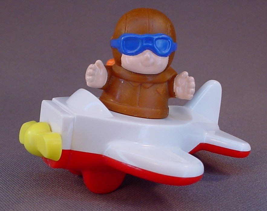 Fisher Price Girl With Red Or Orange Hair Flying A White And Red Airplane, The Pilot Turns In Her Seat, The Propeller Spins, McDonalds Under 3 Toy