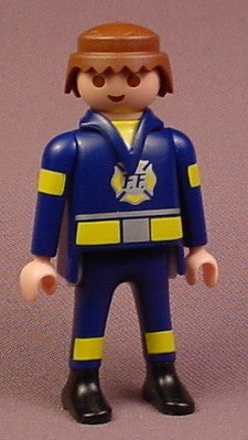 Playmobil Adult Male Fire Fighter Figure In A Blue & Yellow Uniform