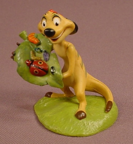 Disney The Lion King Timon Holding A Bug Covered Leaf PVC Figure