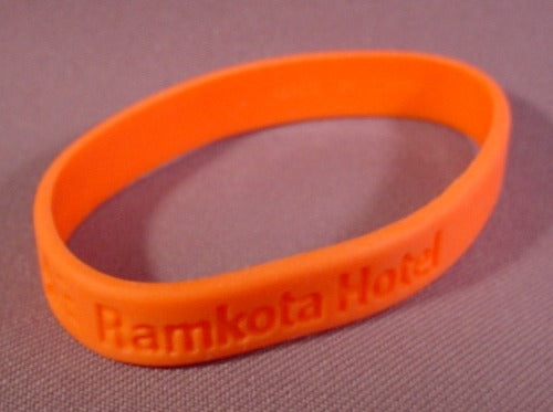 Ramkota Hotel Advertising Promotional Orange Rubber Wrist Band