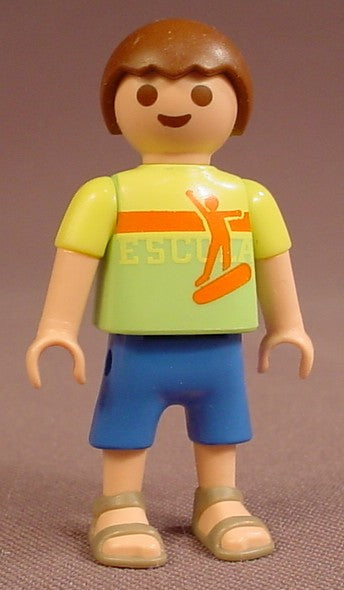 Playmobil Male Boy Child Figure In A Light Or Linden Green Shirt With An Orange Skateboarding Figure Design & Escola In Print, Blue Shorts, Gary Brown Sandals, Brown Hair, 4850 5680