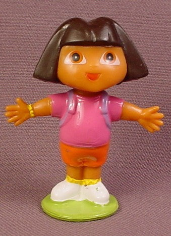 Dora The Explorer With Her Arms Stretched Out PVC Figure On A Round